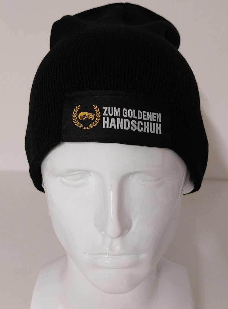 Beanie Mütze, schwarz mit goldenem Logo, Loop-Label – Zum Goldenen Handschuh